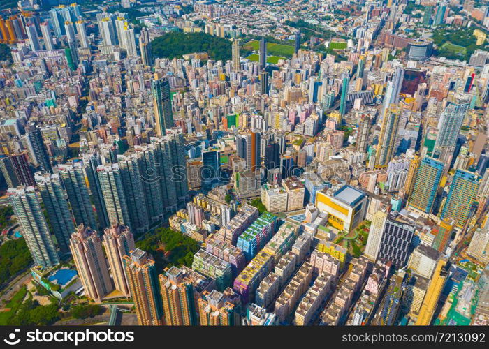 Aerial top view of Hong Kong Downtown, republic of china. Financial district and business centers in smart urban city in Asia. Skyscrapers and high-rise modern buildings at noon.