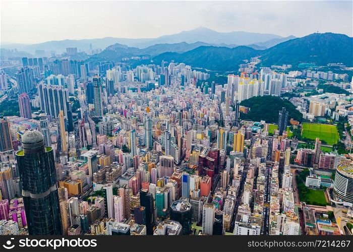 Aerial top view of Hong Kong Downtown, republic of china. Financial district and business centers in smart urban city in Asia. Skyscrapers and high-rise modern buildings at noon.