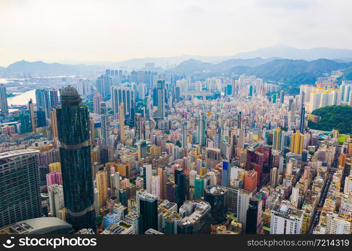 Aerial top view of Hong Kong Downtown, republic of china. Financial district and business centers in smart urban city in Asia. Skyscrapers and high-rise modern buildings at noon.