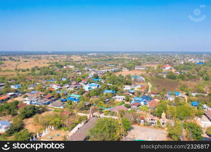 Aerial top view of residential local houses, nature trees, Nonthaburi City, Thailand in urban city town in Asia, buildings.