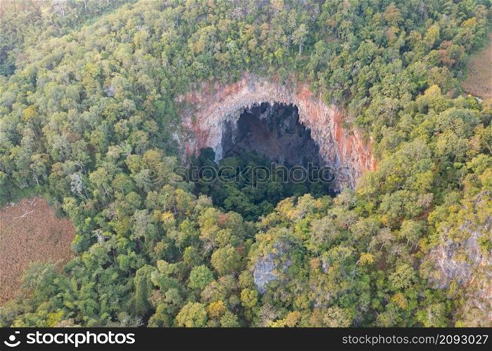 Aerial top view of Spirit Well Cave, Pang Mapha District, Mae Hong Son, Thailand. Tourist attraction landmark. Nature landscape background.