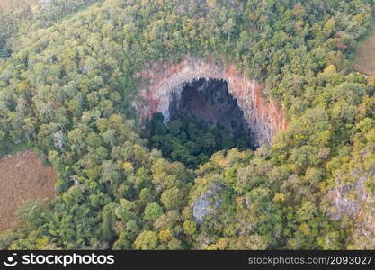 Aerial top view of Spirit Well Cave, Pang Mapha District, Mae Hong Son, Thailand. Tourist attraction landmark. Nature landscape background.