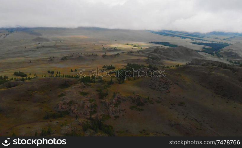 Aerial video of the Kurai steppe between the Kurai and the North Chuia Ranges in the south-eastern Altai, Siberia, Russia. Aerial video of the Kurai steppe