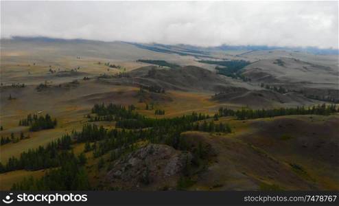 Aerial video of the Kurai steppe between the Kurai and the North Chuia Ranges in the south-eastern Altai, Siberia, Russia. Aerial video of the Kurai steppe