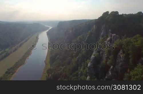 Aerial view a magnificent panoramic of Bastai in Germany next to the river on a sunny day.