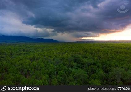 Aerial view Arcus cloud or shelf cloud, Rain storms and black clouds moving over the mountains in dam the north of Thailand, Mae Mo district, L&ang.. Rain storms and black clouds 