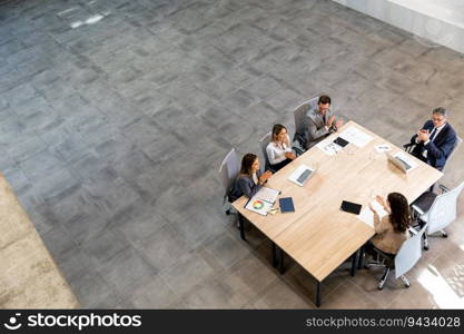 Aerial view at young startup team working in the modern office