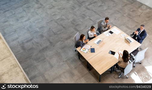 Aerial view at young startup team working in the modern office