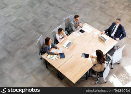 Aerial view at young startup team working in the modern office