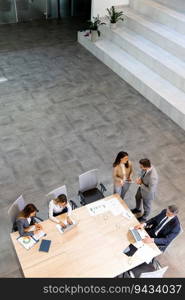 Aerial view at young startup team working in the modern office