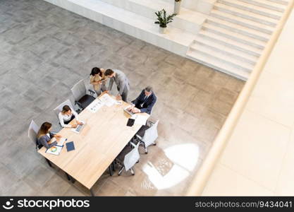 Aerial view at young startup team working in the modern office