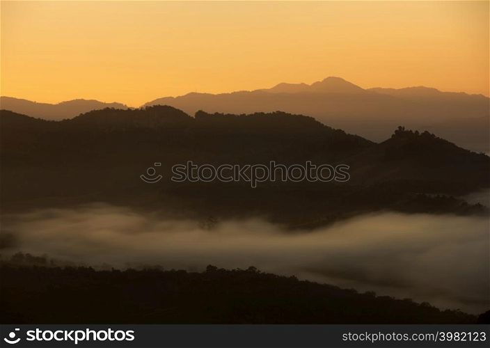 Aerial view Beautiful of morning scenery Golden light sunrise And the mist flows on high mountains, Baan Ja Bo, Mae Hong Son, Thailand. Baan Ja Bo