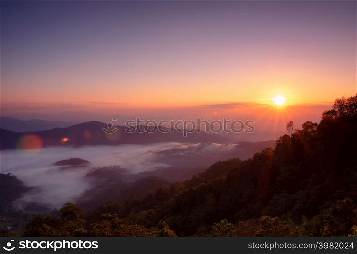 Aerial view Beautiful of morning scenery sea of cloud and the fog flows on high mountains. Doi Montngo, Mae Taeng, Chiang Mai. THailand. Doi Montngo, Mae Taeng, Chiang Mai. THailand