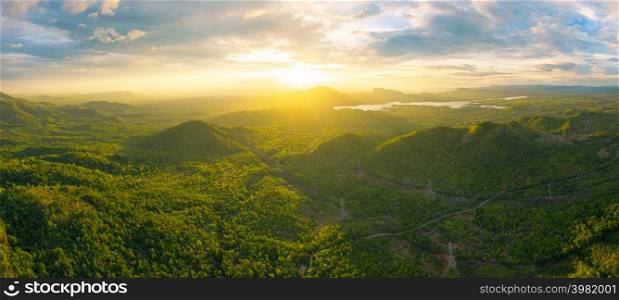 Aerial view, Beautiful Panorama landscape sunset over peak Mountain with warm light Mae Moh Lampang, Thailand.. Mountain with warm light