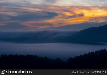 Aerial view Beautiful  panorama of morning scenery Golden light sunrise And the mist flows on high mountains forest. Pang Puai, Mae Moh, L&ang, Thailand.. Pang Puai Morning.