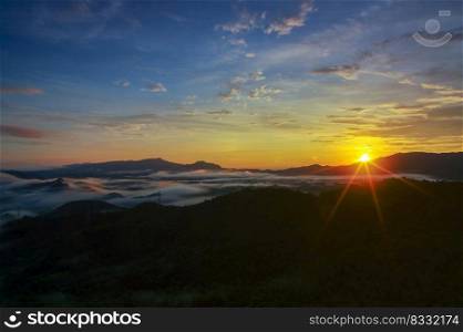 Aerial view Beautiful  panorama of morning scenery Golden light sunrise And the mist flows on high mountains forest. Pang Puai, Mae Moh, L&ang, Thailand.. Pang Puai Morning.