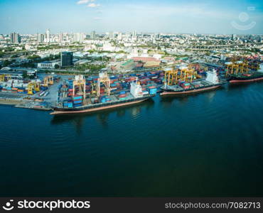 Aerial view container and cargo ship, import export, business logistic supply chain transportation concept and crane at international Port for shipping cargo top view background