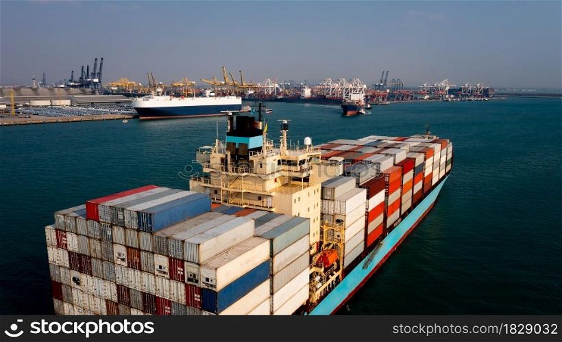 aerial view container cargo ship large carrying commercial container in import export business commerce logistic and transportation of international by container ship and international shipping port background