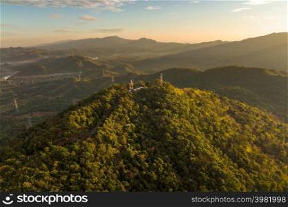 Aerial view forest and broadcasting center in the morning, Pang Puai, Mae Moh, Lampang, Thailand.. Forest and broadcasting center, Pang Puai.
