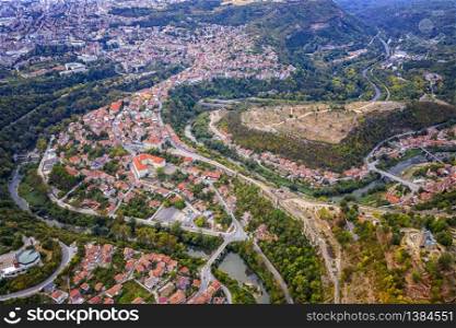 Aerial view from drone of the city and curves of river Yantra, Veliko Tarnovo, Bulgaria