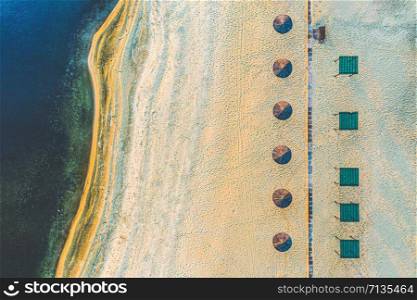 Aerial view from drone top view. Aerial view over autumn empty beach. Beautiful fall nature travel or minimalistic background.