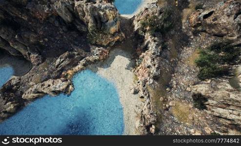 aerial view from flying drone of rocky island in Atlantic ocean