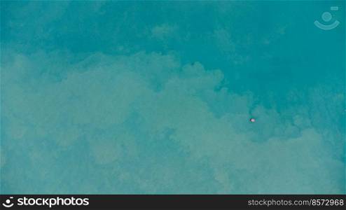 Aerial view from the drone of the sea. background image of sea surface. blue sea background in tropical sea