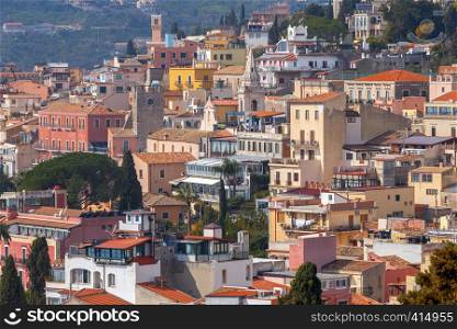 Aerial view from the mountains of the city. Taormina. Sicily. Italy.. Taormina. Aerial view of the city.