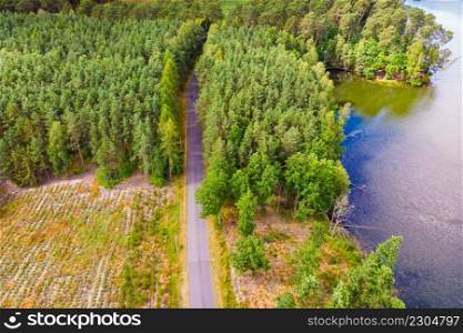 Aerial view. Lake and green forest in Tuchola national park, Poland. Summer landscape in Europe.. Lake in Tuchola Forests, Poland. Aerial view