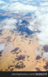 Aerial view landscape near Hurgada town over clouds in Egypt