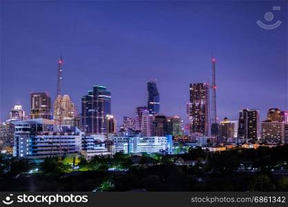 aerial view modern building business in city at dusk and night life background