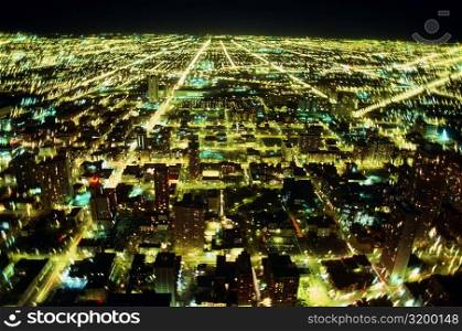 Aerial view of a city lit up at night, Chicago, Illinois, USA