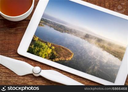 aerial view of a morning fog over lake, early fall scenery in northern Colorado, screen picture copyright by the photographer