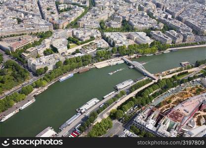 Aerial view of a river passing through a city, Passerelle Debilly, Seine River, Paris, France