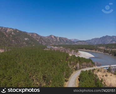 Aerial view of a road in summer landscape, in Altai mountains,. Aerial view of a road in summer landscape