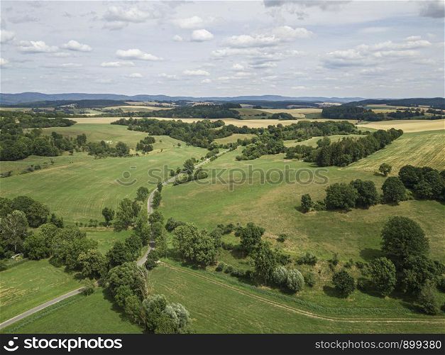 Aerial view of a scenic rural landscape area in thuringa with forest and fields