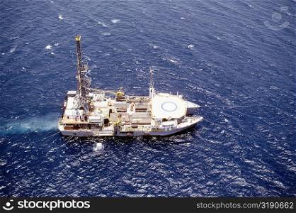 Aerial view of an oil drilling ship in the sea