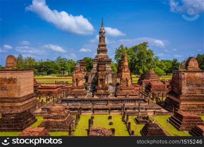Aerial view of Ancient Buddha statue at Wat Mahathat temple in Sukhothai Historical Park, Thailand.