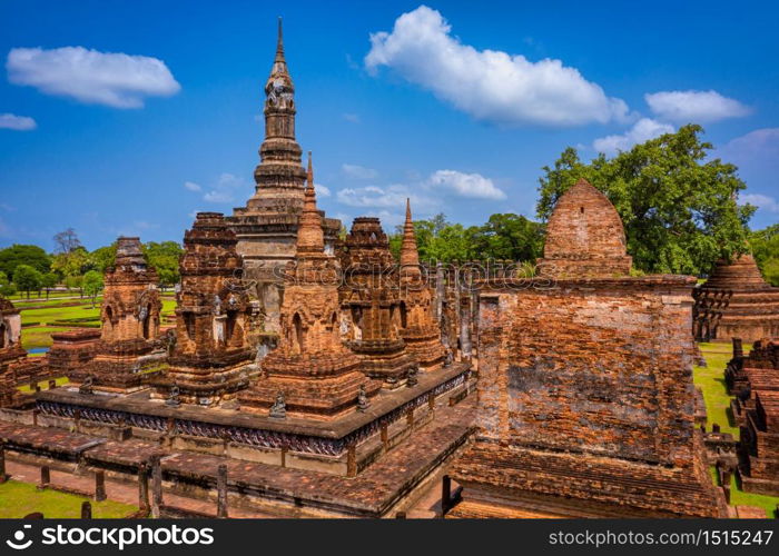 Aerial view of Ancient Buddha statue at Wat Mahathat temple in Sukhothai Historical Park, Thailand.