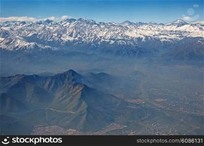 aerial view of Andes and Santiago with smog, Chile
