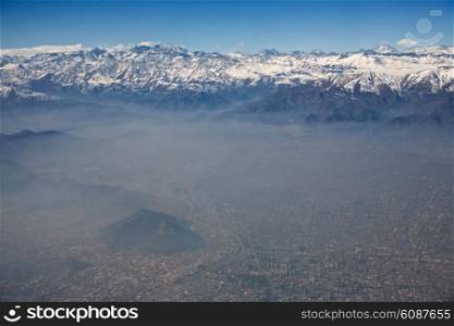 aerial view of Andes and Santiago with smog, Chile