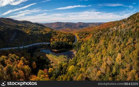 Aerial view of Appalachian Gap road or Route 17 between Vergennes to Waitsfield in Vermont during the fall. Aerial view of Appalachian Gap Road in Vermont