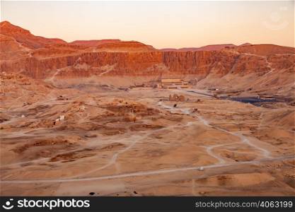 Aerial view of archaeological site in Valley of The Kings with temple of Pharaoh Hatshepsut in Theban Necropolis, Luxor, Upper Egypt.