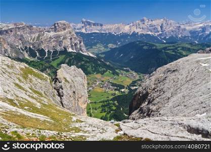 aerial view of Badia Valley with Colfosco village from Sella mount, south tyrol, Italy