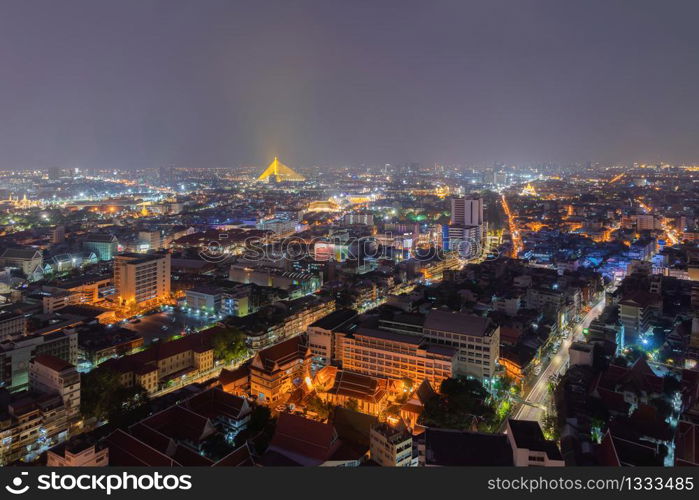 Aerial view of Bangkok Downtown skyline, Thailand. Financial business district and residential area in smart urban city. Skyscraper and high-rise buildings at night time.