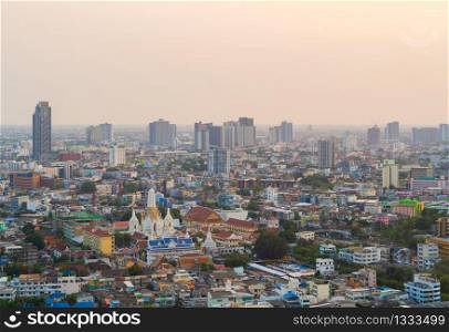 Aerial view of Bangkok Downtown skyline, Thailand. Financial business district and residential area in smart urban city. Skyscraper and high-rise buildings at sunset time.