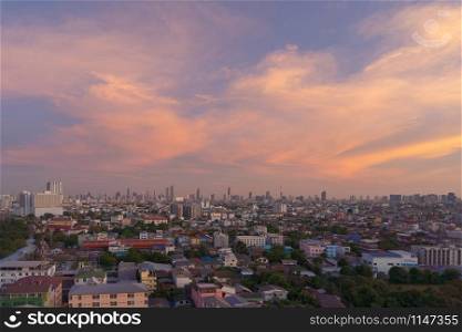 Aerial view of Bangkok Downtown Skyline. Thailand. Financial district and business centers in smart urban city. Skyscraper and high-rise office buildings at sunset.
