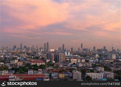 Aerial view of Bangkok Downtown Skyline. Thailand. Financial district and business centers in smart urban city. Skyscraper and high-rise office buildings at sunset.