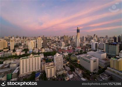 Aerial view of Bangkok Downtown Skyline. Thailand. Financial district and business centers in smart urban city in Asia. Skyscraper and high-rise buildings at sunset.