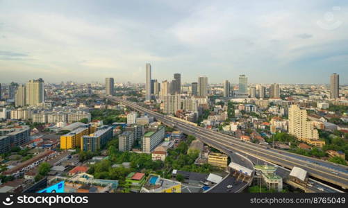 Aerial view of Bangkok Downtown Skyline, Thailand. Financial district and business centers in smart urban city in Asia. Skyscraper and high-rise buildings at sunset.